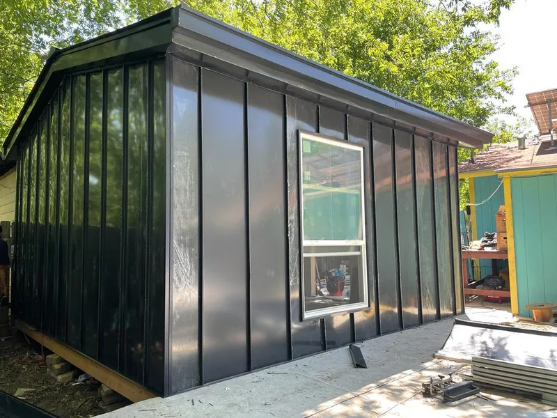 Black standing seam metal wall panels for Roof Inspection in Solvang